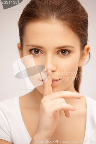 Image of finger on lips