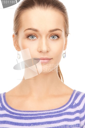 Image of lovely woman in striped sweater