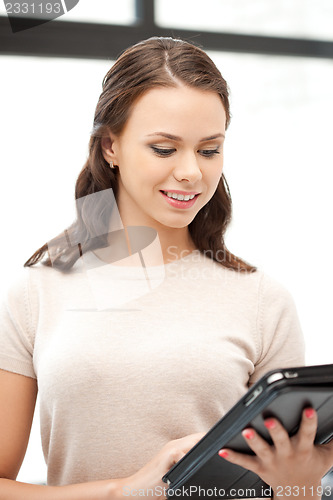 Image of happy woman with tablet pc computer