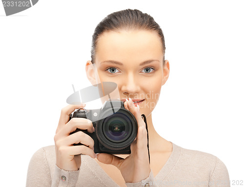 Image of teenage girl with digital camera