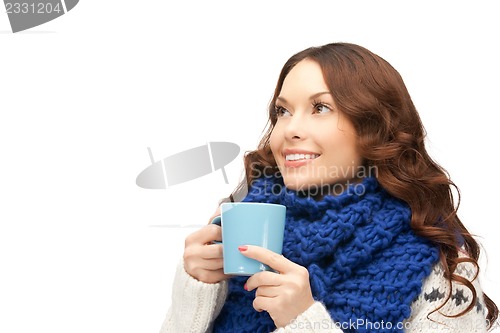 Image of woman with blue mug