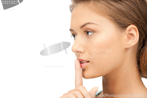 Image of finger on lips