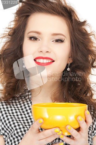 Image of lovely housewife with cup