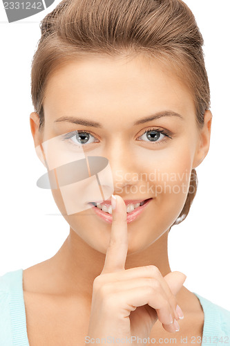 Image of finger on lips