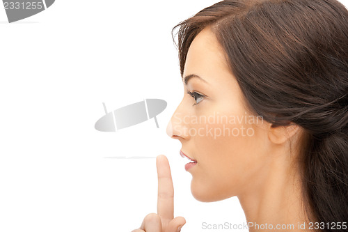 Image of finger on lips