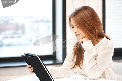 Image of happy woman with tablet pc computer