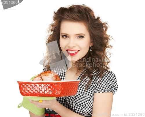 Image of lovely housewife with meat