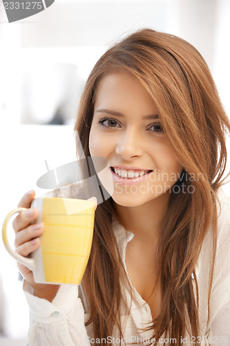 Image of lovely woman with mug