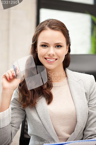 Image of happy woman with big notepad