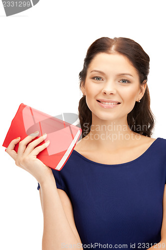 Image of happy and smiling woman with book