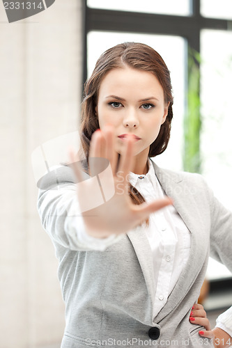 Image of woman making stop gesture