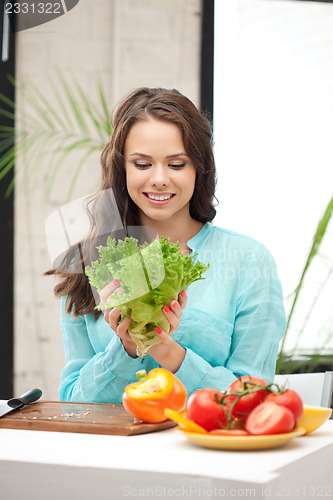 Image of beautiful woman in the kitchen
