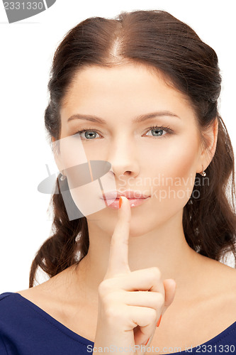 Image of finger on lips