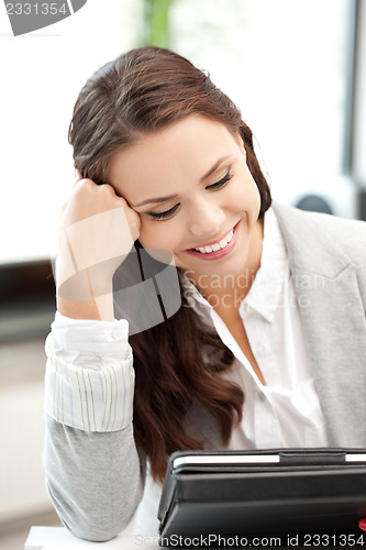 Image of happy woman with tablet pc computer
