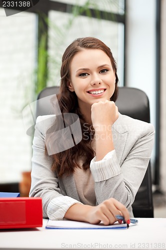 Image of happy woman with big notepad