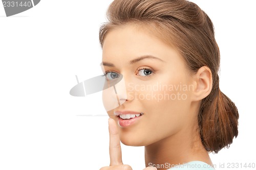 Image of finger on lips