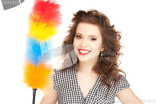 Image of beautiful woman with cleaning sweep