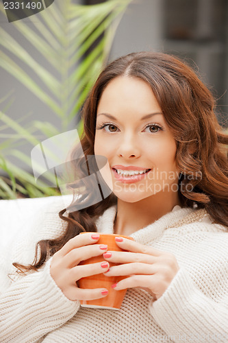 Image of lovely woman with mug