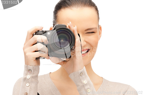 Image of teenage girl with digital camera