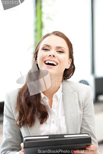 Image of happy woman with tablet pc computer