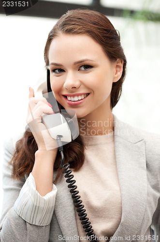 Image of businesswoman with phone
