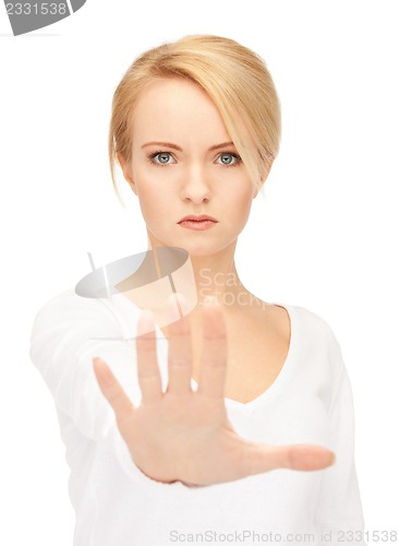 Image of woman making stop gesture