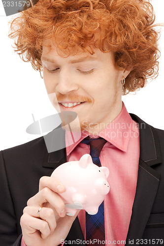 Image of man with piggy bank