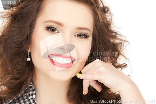Image of woman making a call me gesture