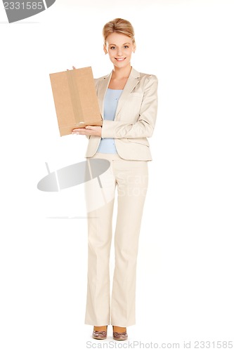 Image of attractive businesswoman with cardboard box