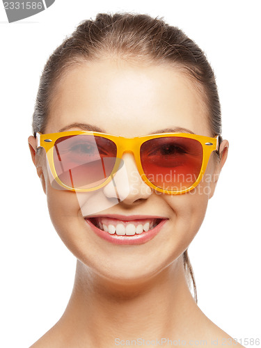 Image of happy teenage girl in shades