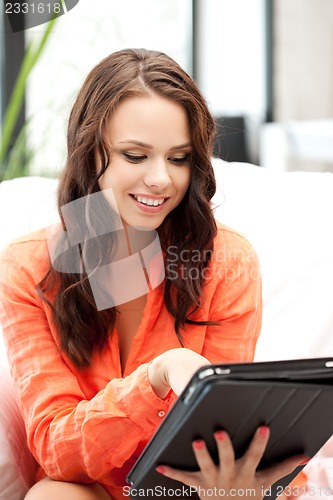 Image of happy woman with tablet pc computer