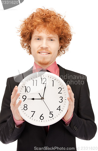 Image of man with clock