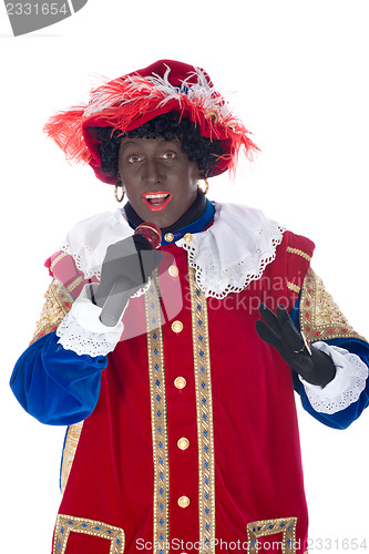 Image of Zwarte Piet with microphone