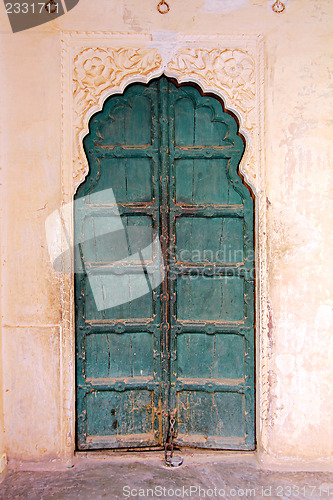 Image of old wooden closed door in india