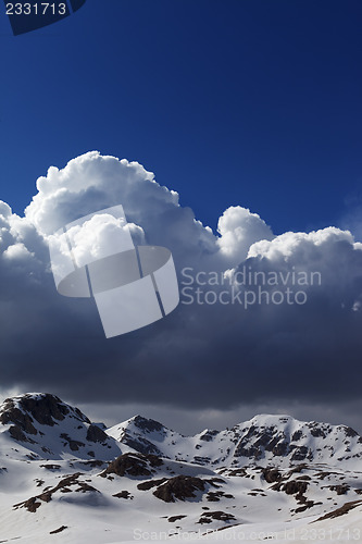 Image of Snowy mountains and blue sky