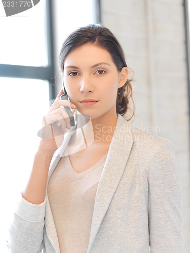 Image of businesswoman with cell phone