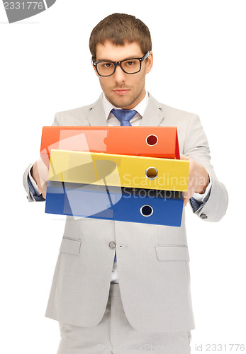 Image of man with folders