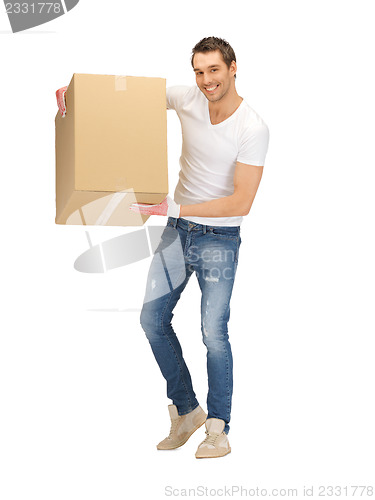 Image of handsome man with big box