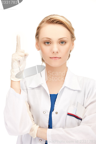 Image of female doctor with her finger up