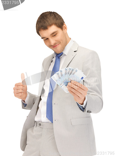 Image of handsome man with euro cash money