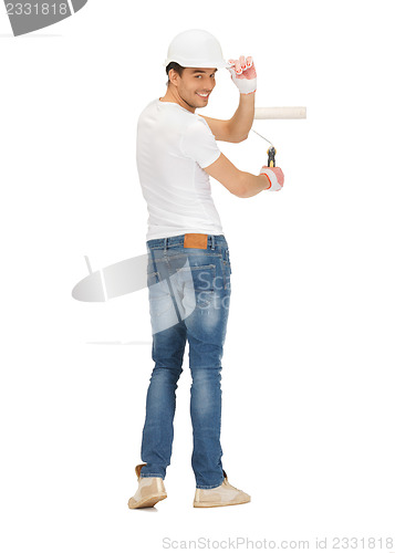Image of handsome painter in helmet
