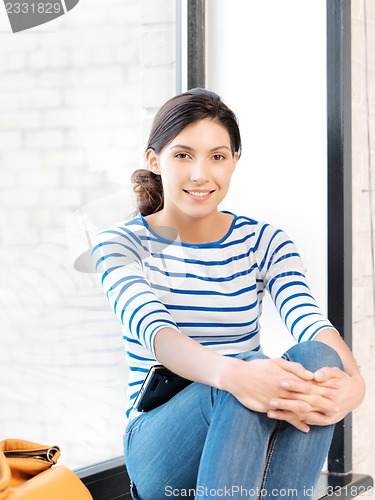 Image of happy and smiling teenage girl