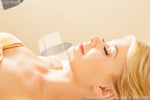 Image of beautiful woman in spa salon