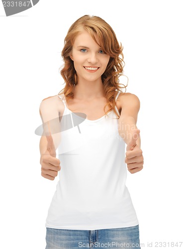 Image of teenage girl in blank white t-shirt with thumbs up