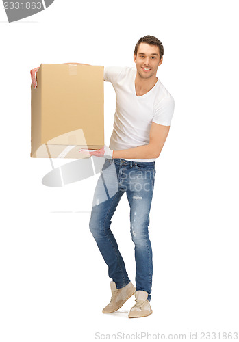 Image of handsome man with big box