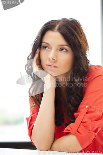 Image of calm and serious woman