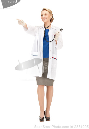 Image of attractive female doctor pointing her finger