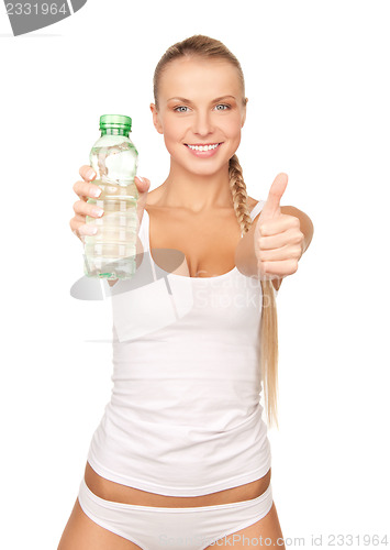 Image of young beautiful woman with  bottle of water