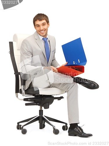 Image of man with folders
