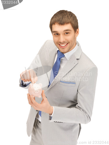 Image of man with piggy bank